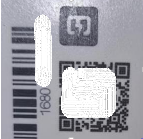 Zdjęcie etykiety licznika Iskraemeco z kodem kreskowym, kodem QR i numerem seryjnym zaczynającym się od 1680